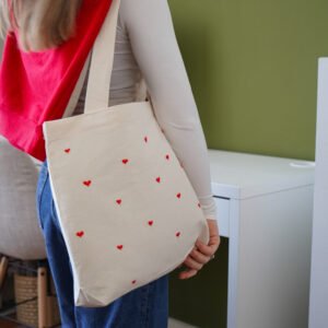 "Loving stitches" -  hand embroidered cotton bag